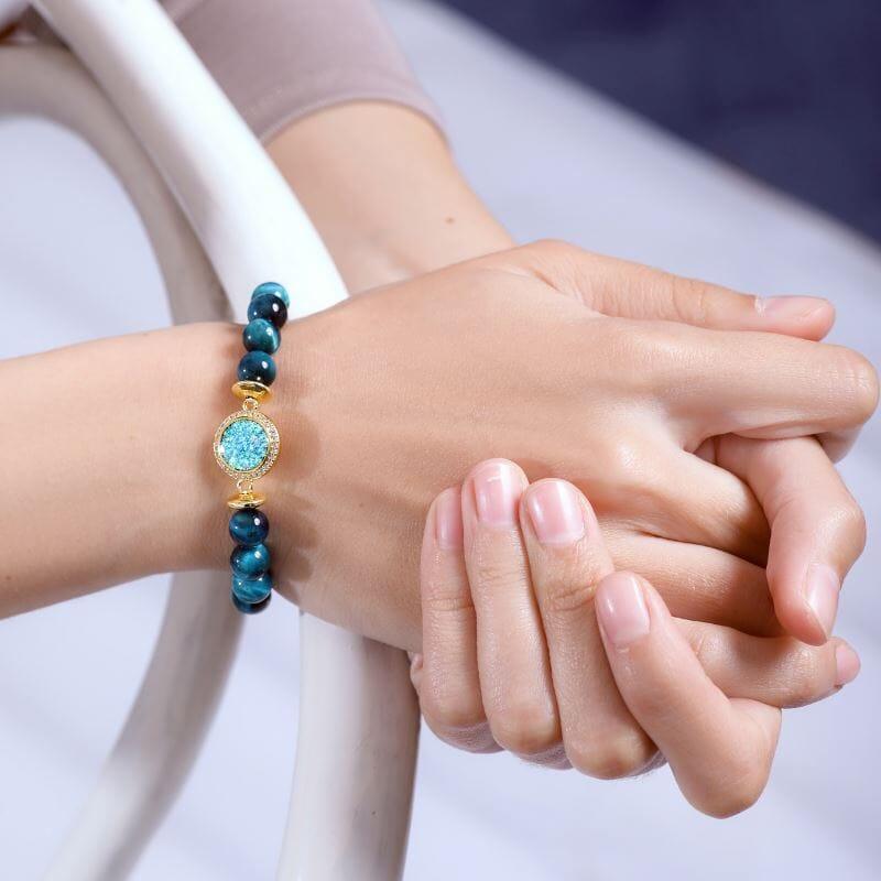 Braccialetto "Magnificenza Regale" con Perline in Occhio di Tigre e Opale