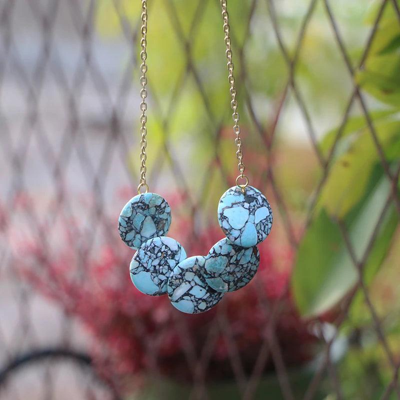 Collana con Pendente "Cinque Cerchi di Gioia" in Turchese