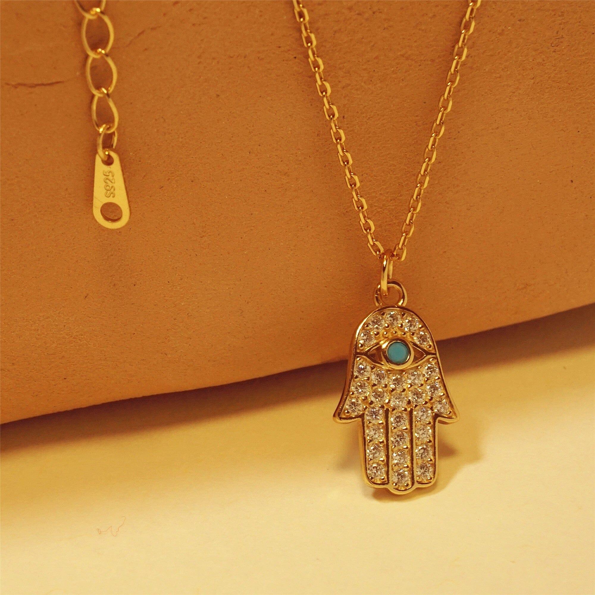 Collana "Fortuna Floreale" con Ciondolo Hamsa in Turchese e Oro