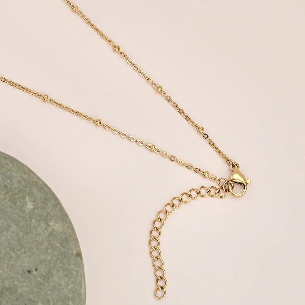 Collana di Morganite e Granato “Fioritura Elegante”