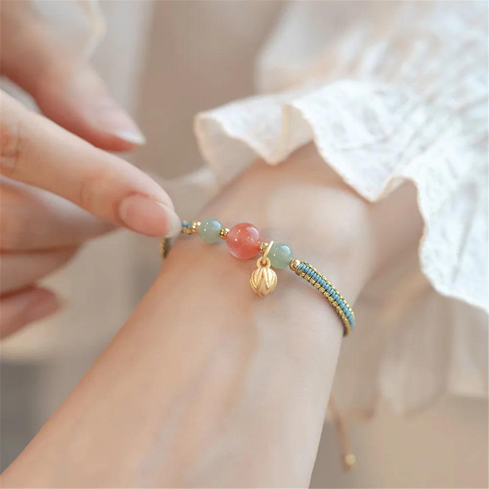 Bracciale "Treccia di Armonia" in Agata Rossa e Giada