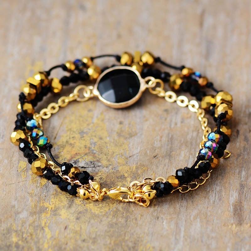 Bracciale "Aura Benefica" con Perline Dorate in Onice Nera